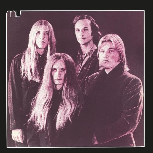 Four people with long hair pose for a purple-toned album cover.