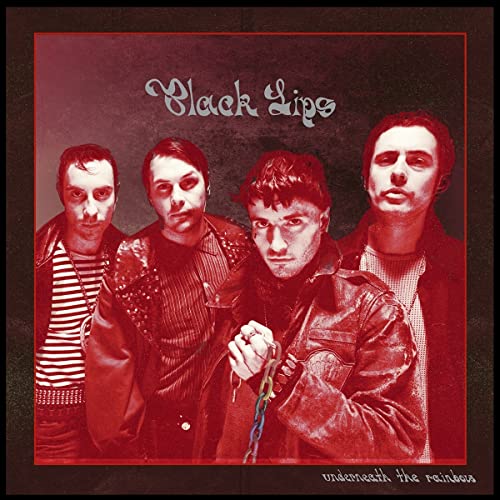 Red-toned album cover featuring four young men, band Black Lips, and text.