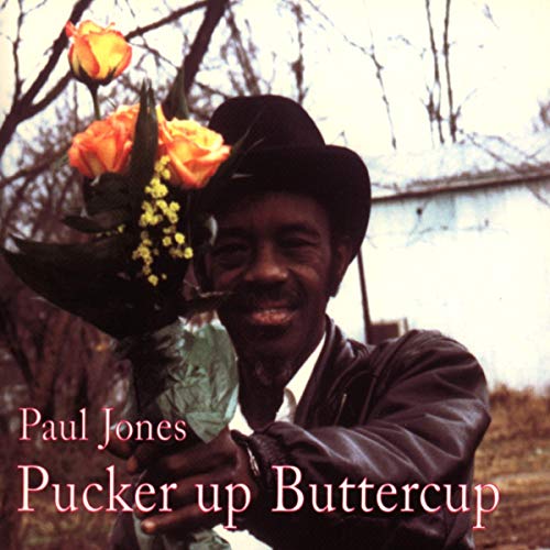 Paul Jones album cover: man in hat holding orange roses.
