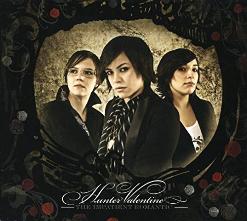 CD cover featuring three women in dark clothing, ornate floral border.