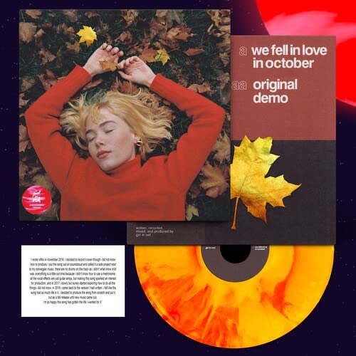Vinyl record featuring a woman lying amongst autumn leaves, red cover art.