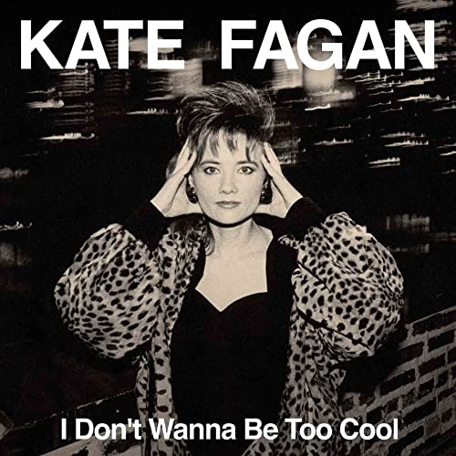 Black and white album cover featuring Kate Fagan with hands on head.