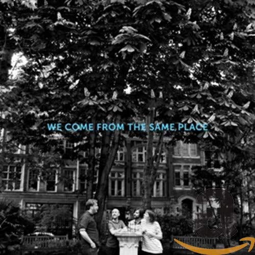 Black and white album cover with trees, buildings, and people.
