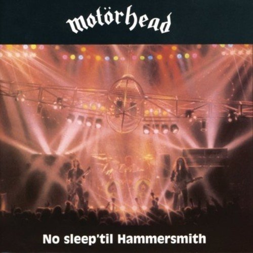 "Motörhead album cover featuring a band performing on stage with bright lights."
