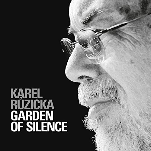Black and white portrait of Karel Ruzicka with glasses, album title visible.