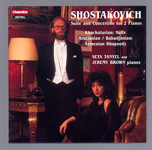CD cover featuring portrait of a man and woman with pianos in background.