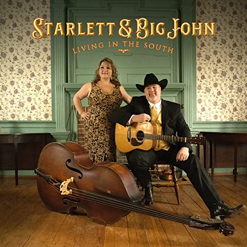 CD cover featuring two musicians with a guitar and bass.