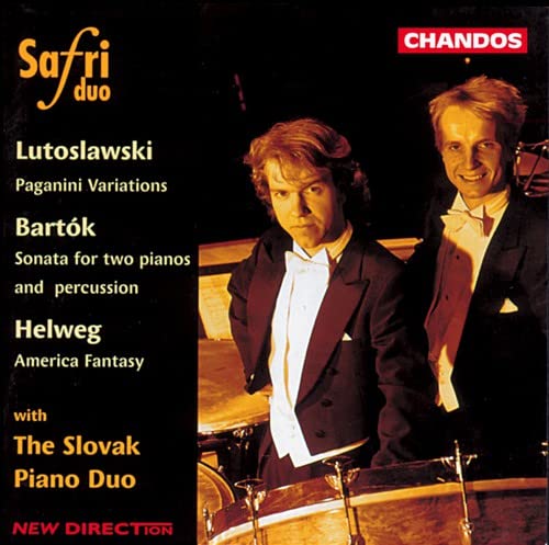 CD cover featuring two formally dressed musicians with percussion instruments.