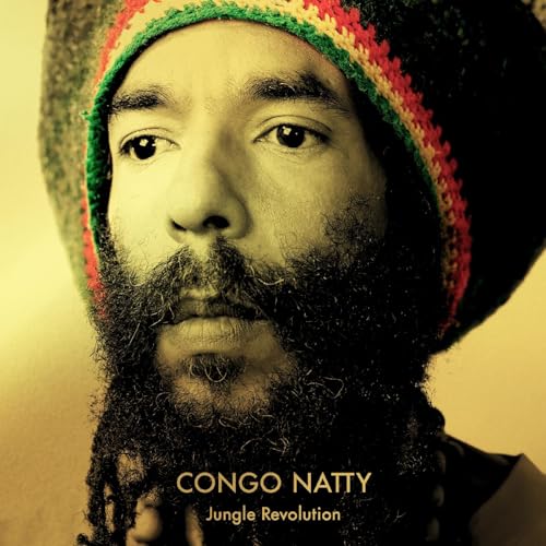 Portrait of Natty, with a knitted cap and full beard, album cover.
