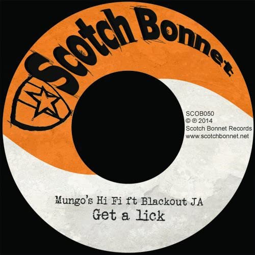 Orange and white vinyl record label with black center hole and text.