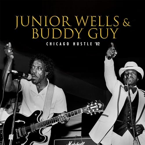 Junior Wells and Buddy Guy performing live with instruments, black and white.