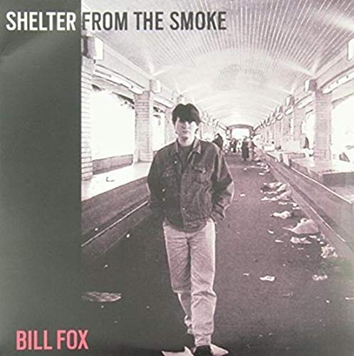 Vinyl album cover featuring a man standing in a subway tunnel.