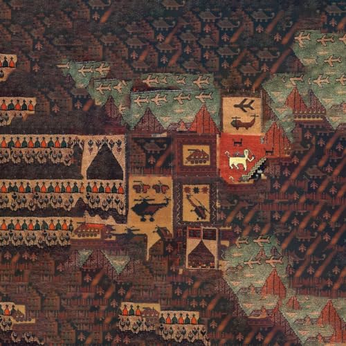 Close-up of a richly patterned, woven rug with geometric shapes.