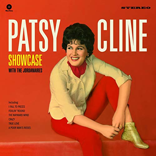 Patsy Cline album cover, red background, artist seated in red pants.