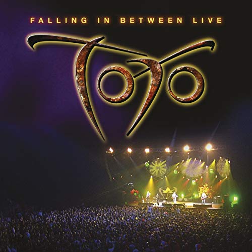 Toto “Falling In Between Live” album cover with band on stage.