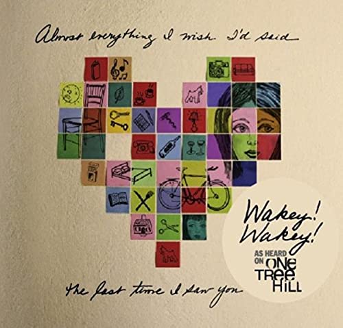 CD cover with colorful, fragmented heart shape and partial face.