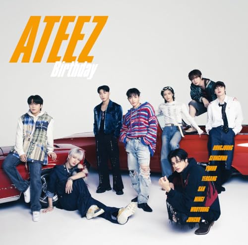 Ateez band members posing near a red car with text overlay.