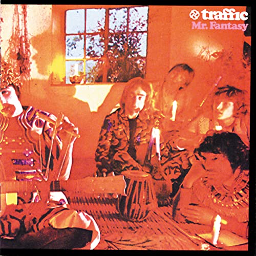 Mr. Fantasy" vinyl album cover by Traffic, featuring musicians in warm tones.