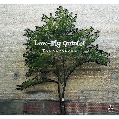 CD cover: tree silhouette against a textured brick wall.