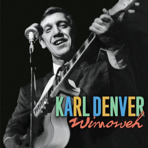 Black and white photo of Karl Denver singing with a guitar, album cover.