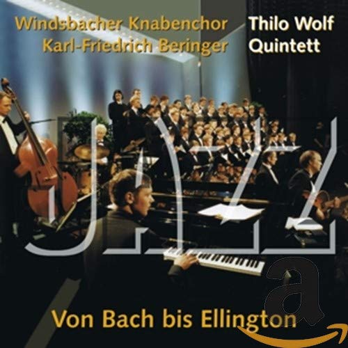 Choir performing with jazz musicians on stage, album cover art.