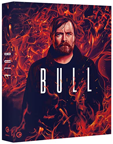 Blu-ray cover for "Bull" featuring a man with a beard against flames.