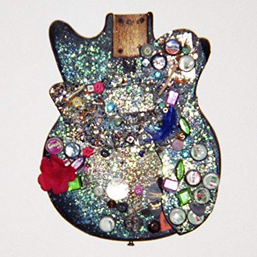 CD case back decorated with glittering jewels and colorful found objects.