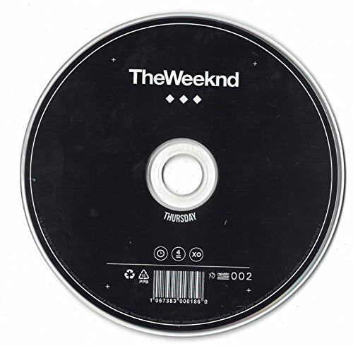 Black vinyl record labeled "The Weeknd - Thursday" with a barcode.