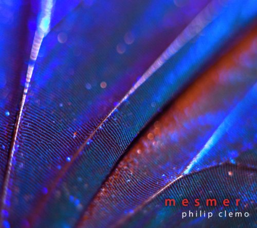 Close-up of iridescent peacock feathers with album title "Mesmer" text.