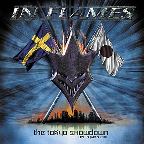 In Flames album cover: skull, flags, city skyline, and fiery background.