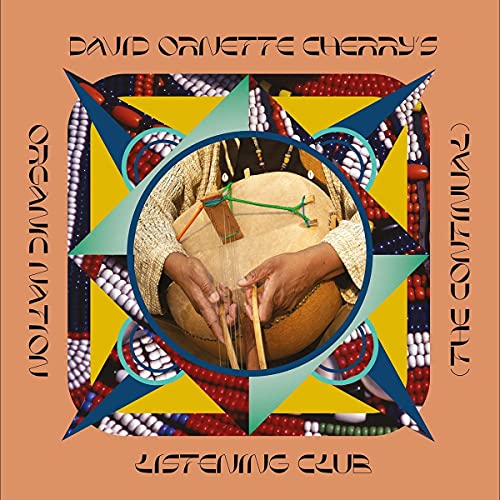 CD cover: hands playing a drum within a starburst design.