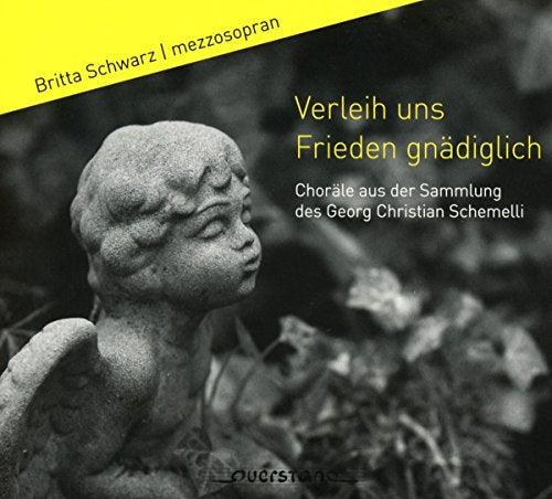 CD cover featuring a stone angel statue against a dark, blurred background.