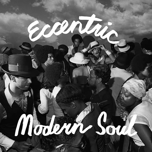 Black and white photo of a crowd in hats, album cover art.