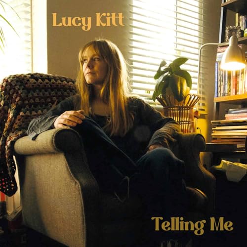 CD cover for Lucy Kitt’s “Telling Me” featuring a woman in an armchair.