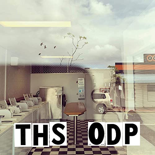 Vinyl album cover with a laundromat scene and large text “THS ODP”.