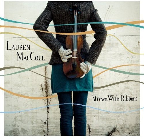 CD cover: person holding a violin against a textured wall.
