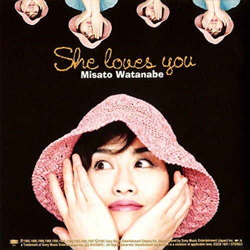CD cover: Misato Watanabe under a pink hat, looking upwards.