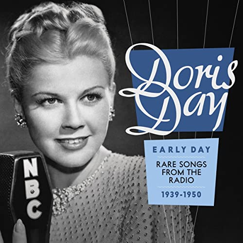 Black and white portrait of Doris Day with microphone and album title.