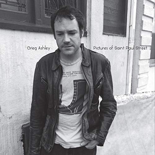 Black and white album cover featuring a man in a leather jacket.