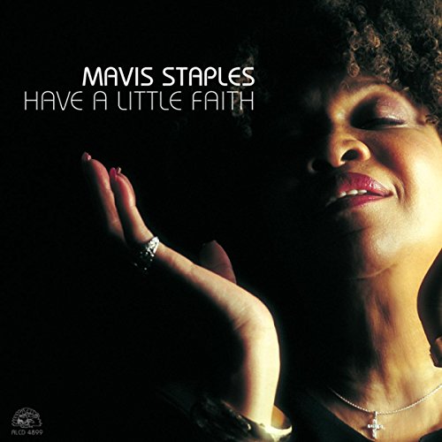 Mavis Staples album cover, close-up of her face with raised hand.
