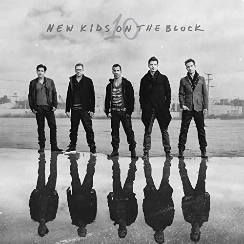 New Kids on the Block album cover featuring five men in a cityscape.