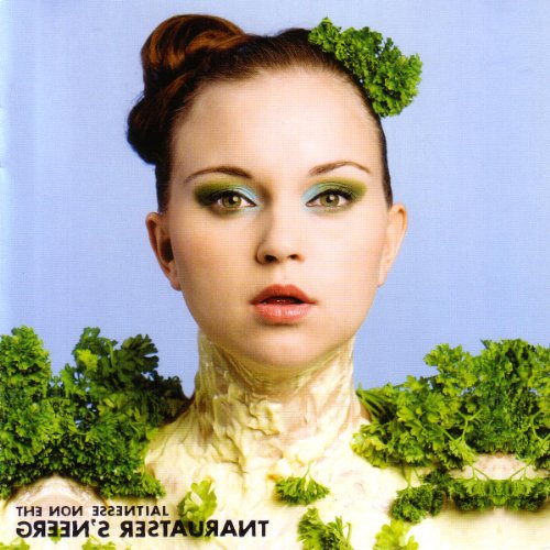 Woman with green eyeshadow and parsley adornments, CD cover art.