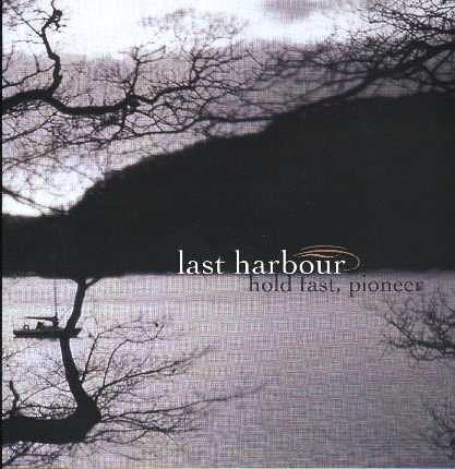 CD cover: dark landscape with water, tree branches, and text.