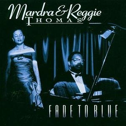 CD cover featuring a woman and man with a piano in blue tones.