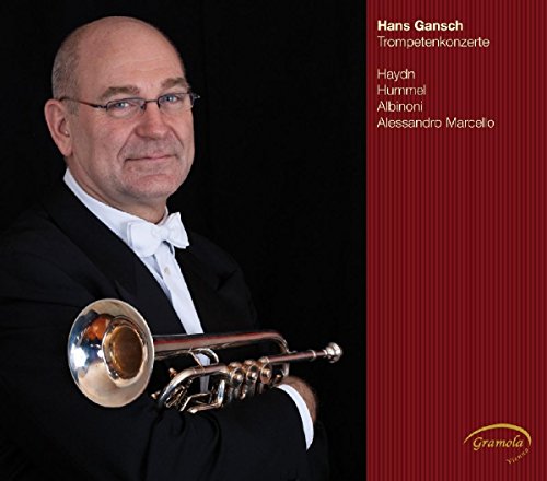 Man with trumpet on red album cover, classical music CD.
