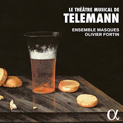 CD cover: still life with beer, bread, dark background, text.