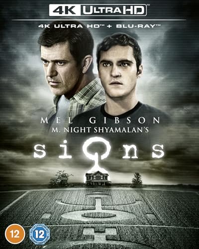 Movie cover art for Signs featuring Mel Gibson and Joaquin Phoenix above a crop circle.