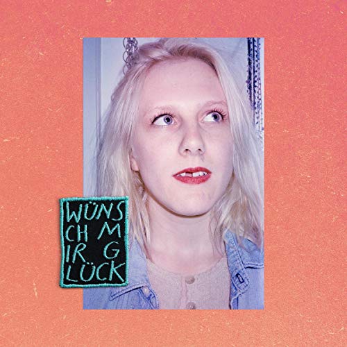 CD cover with a portrait of a blonde woman and blue text.