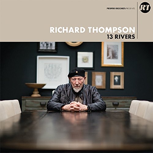 Richard Thompson album cover: man seated before framed photos.