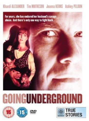 DVD cover art for Going Underground featuring a woman holding two children.